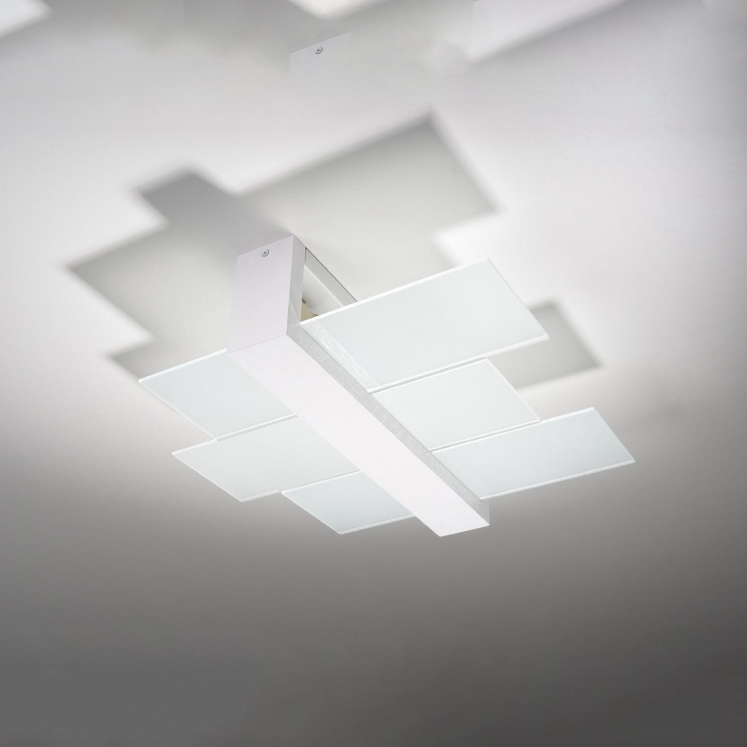 lámpara de techo FENIKS 2 blanca, elegante y minimalista, ideal para cualquier espacio. Su diseño moderno aporta luminosidad y estilo, creando un ambiente acogedor y contemporáneo.