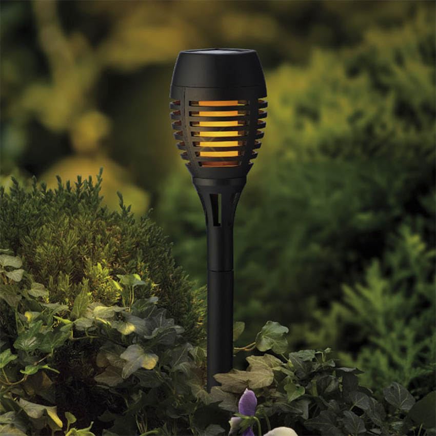 set de 4 estacas solares efecto llama Ø7,5x27cm, colores surtidos, ideales para decoración exterior y ambientar jardines o terrazas.